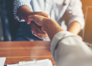 Business People Handshake Greeting Deal at work.