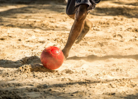 Boy playing football